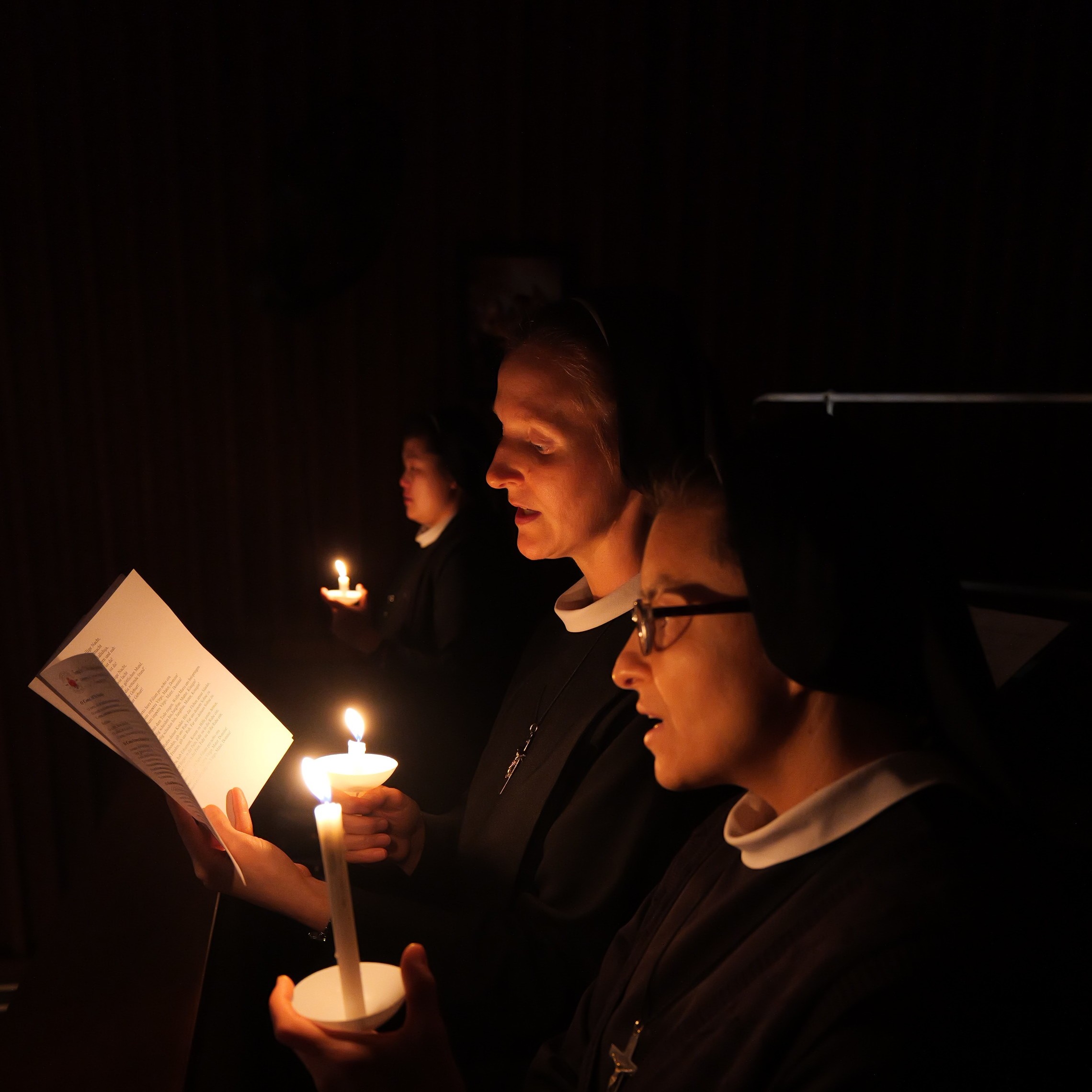 Sisters of St. Francis of the Martyr St. George praying in the chapel during candle procession