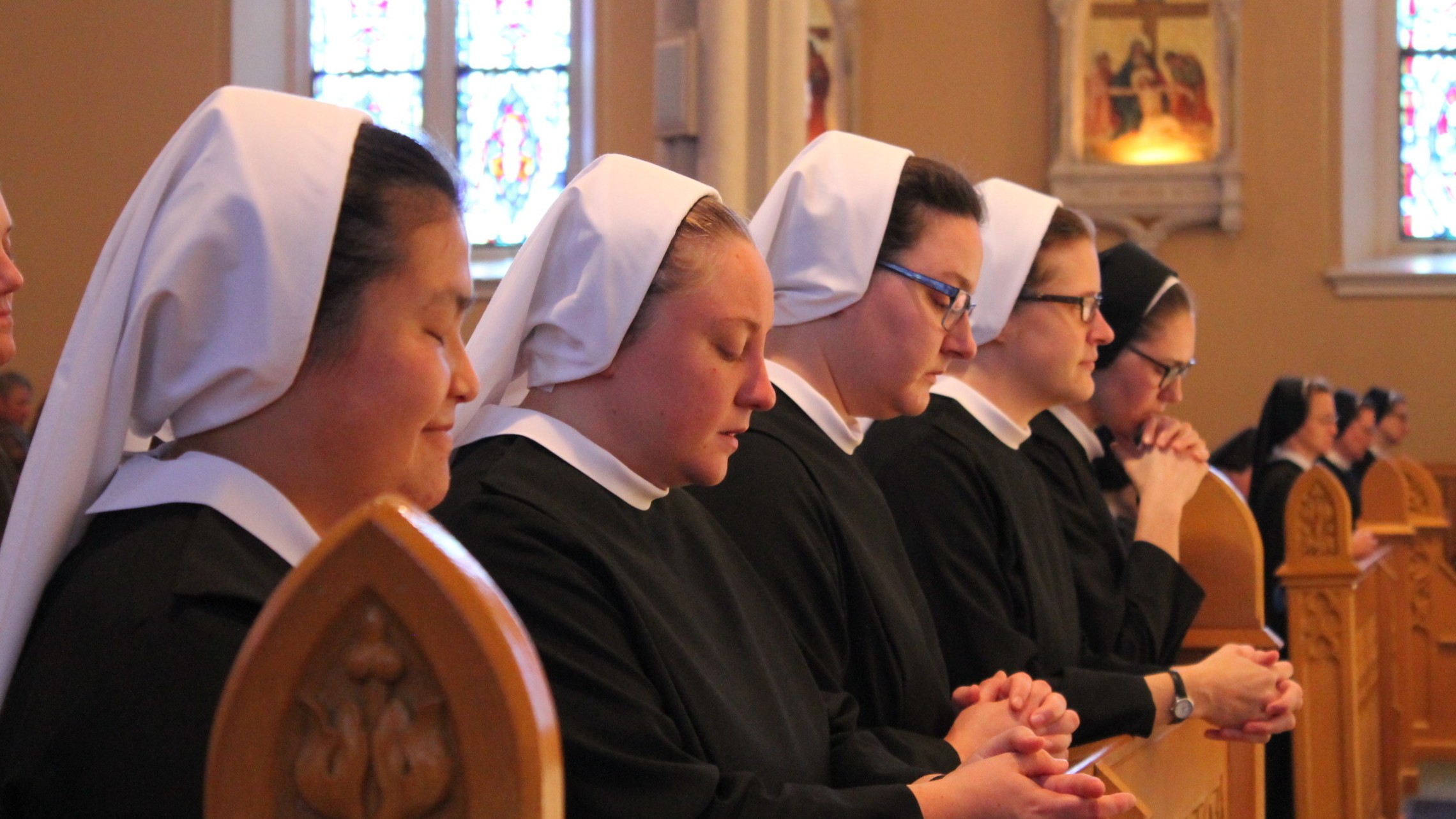 Novices praying